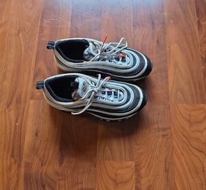 Black and White Kids Athletic Sneakers with Orange Accent